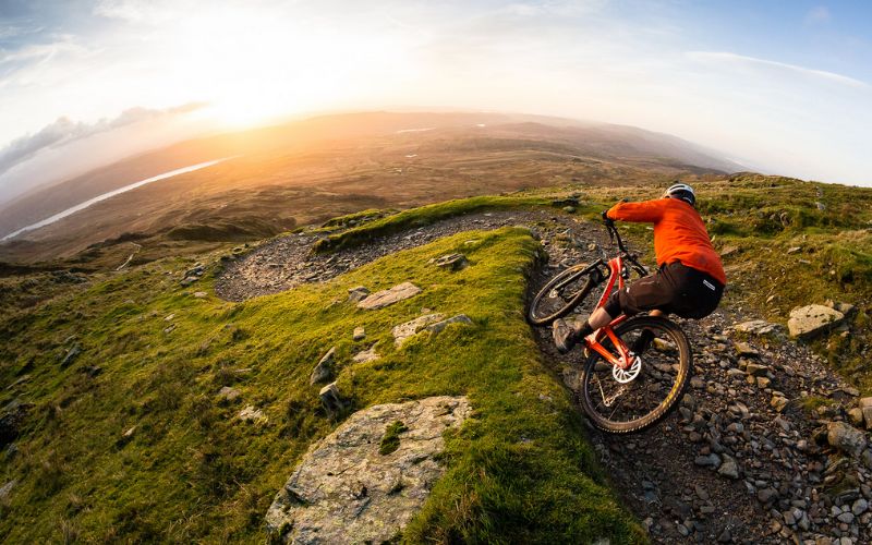 someone mountain biking