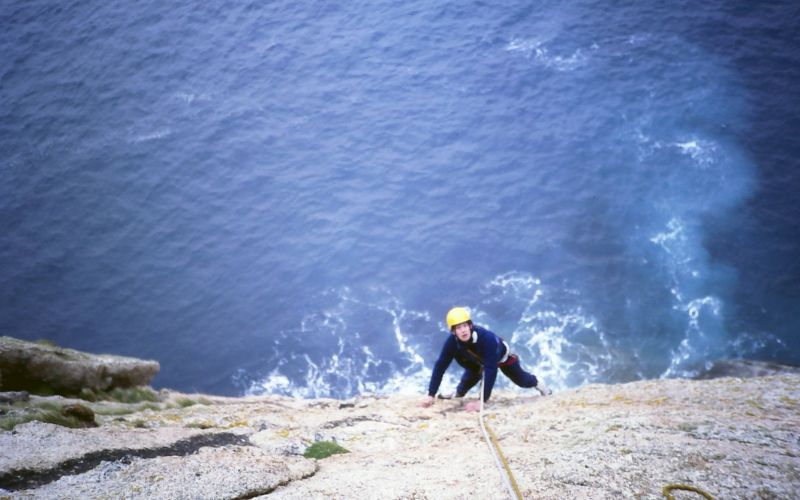 someone rock climbing