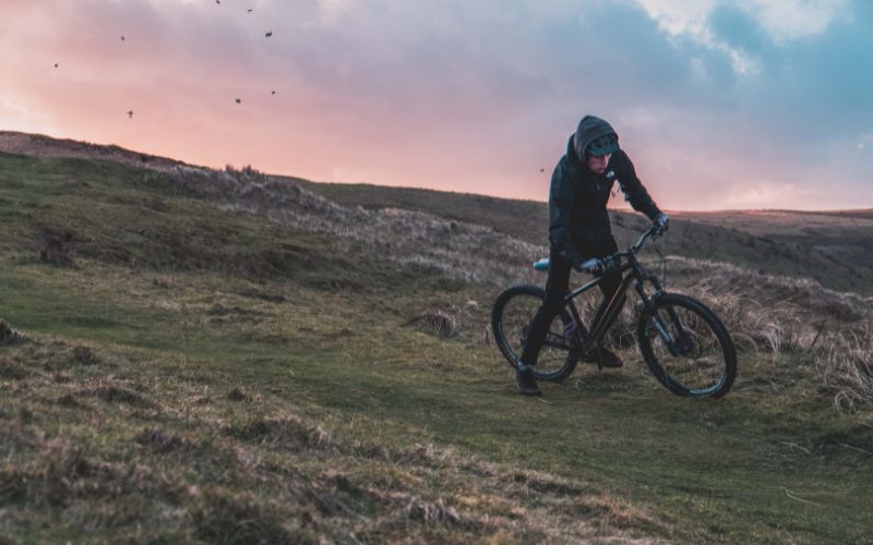 someone mountain biking