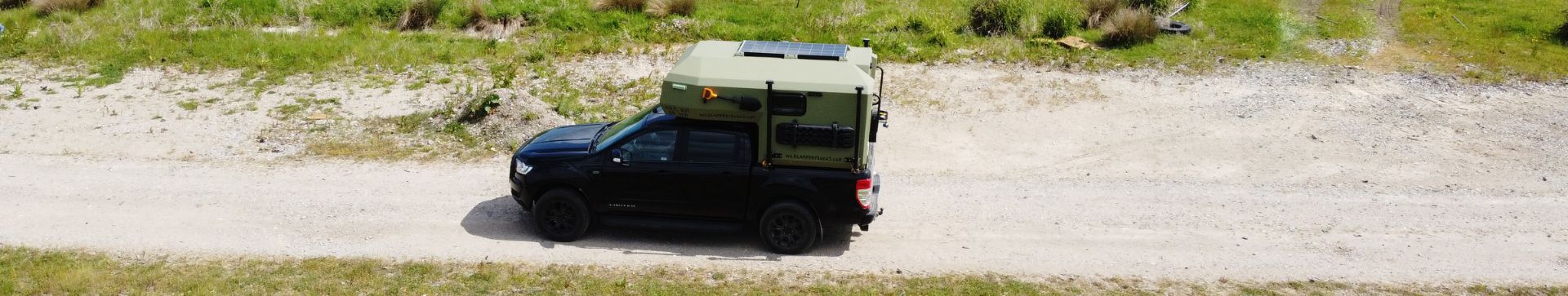 Wild Camper Truck on a dirt track