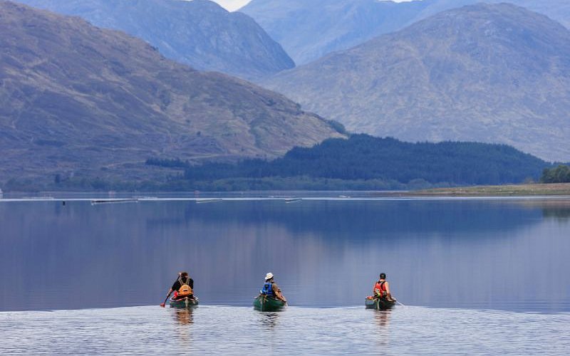 three people kayaking